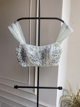 White Embroidered floral sleeveless blouse