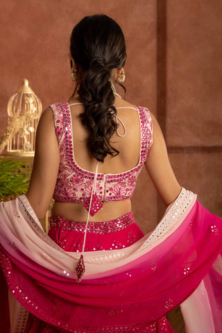 Hot pink mirror embroidered lehenga with raw silk blouse paIred with chikankari Ombre dupatta
