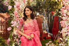 Pink Leheriya saree with embroidered blouse