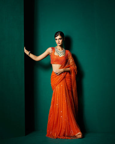 vithi Net drape saree with
Blouse - Persimmon Orange