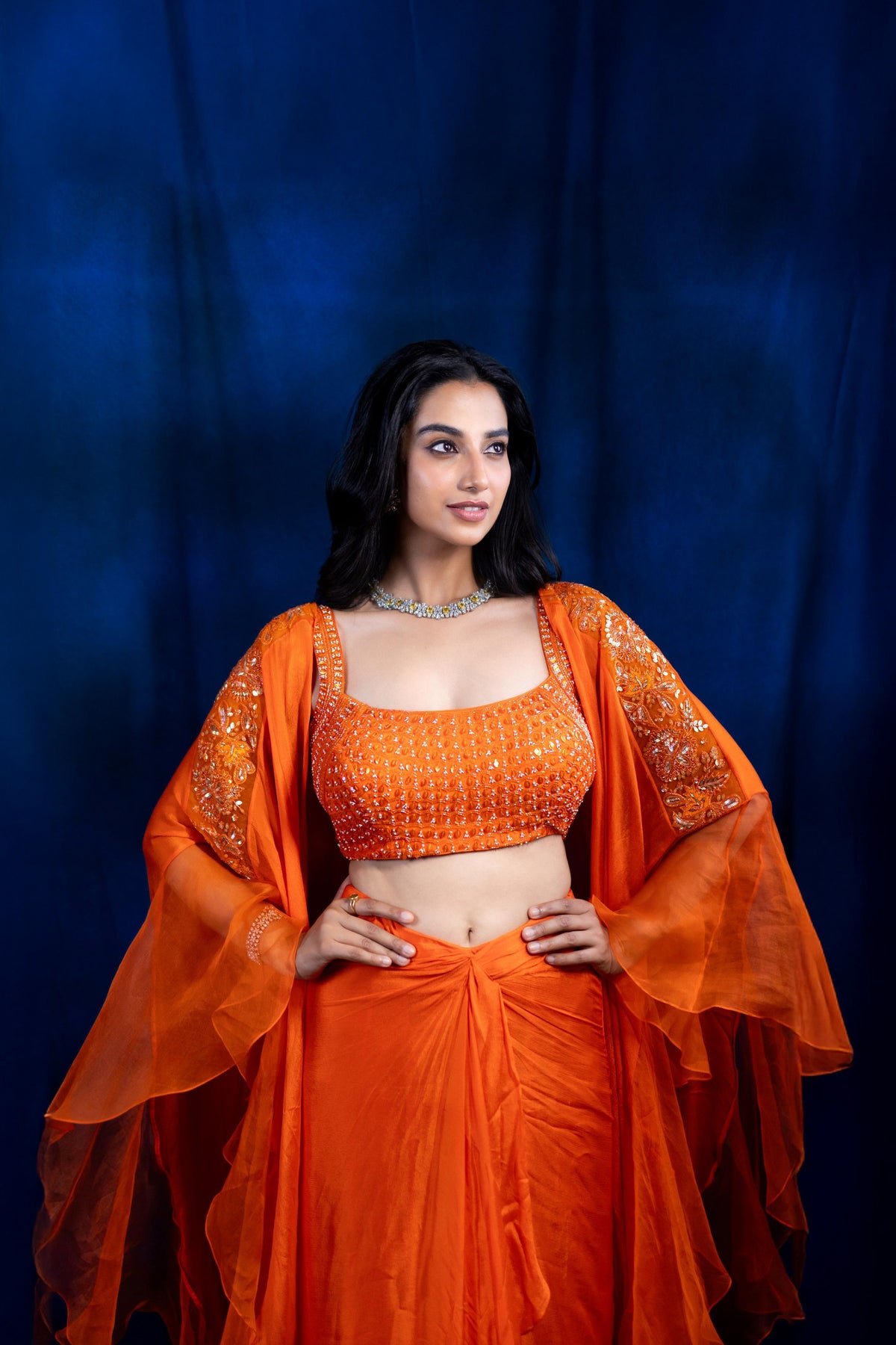 Zoha drape skirt set with rufflecape - Persimmon Orange | Meenakshi Chaudhary