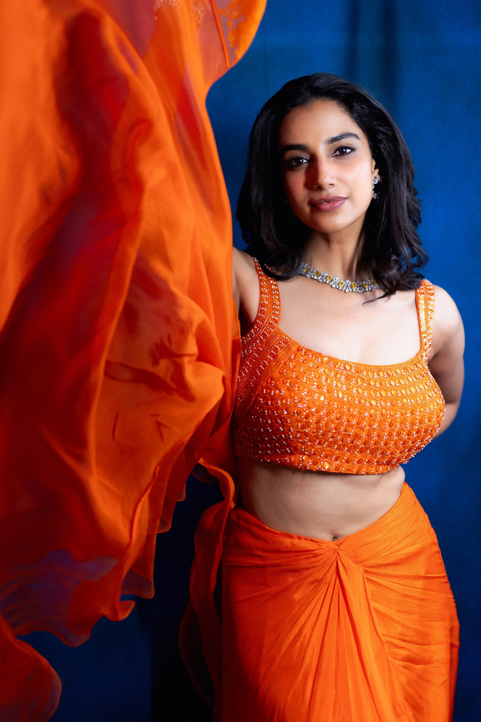 Zoha drape skirt set with rufflecape - Persimmon Orange | Meenakshi Chaudhary